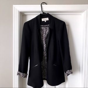 Black blazer with silk printed detailing!